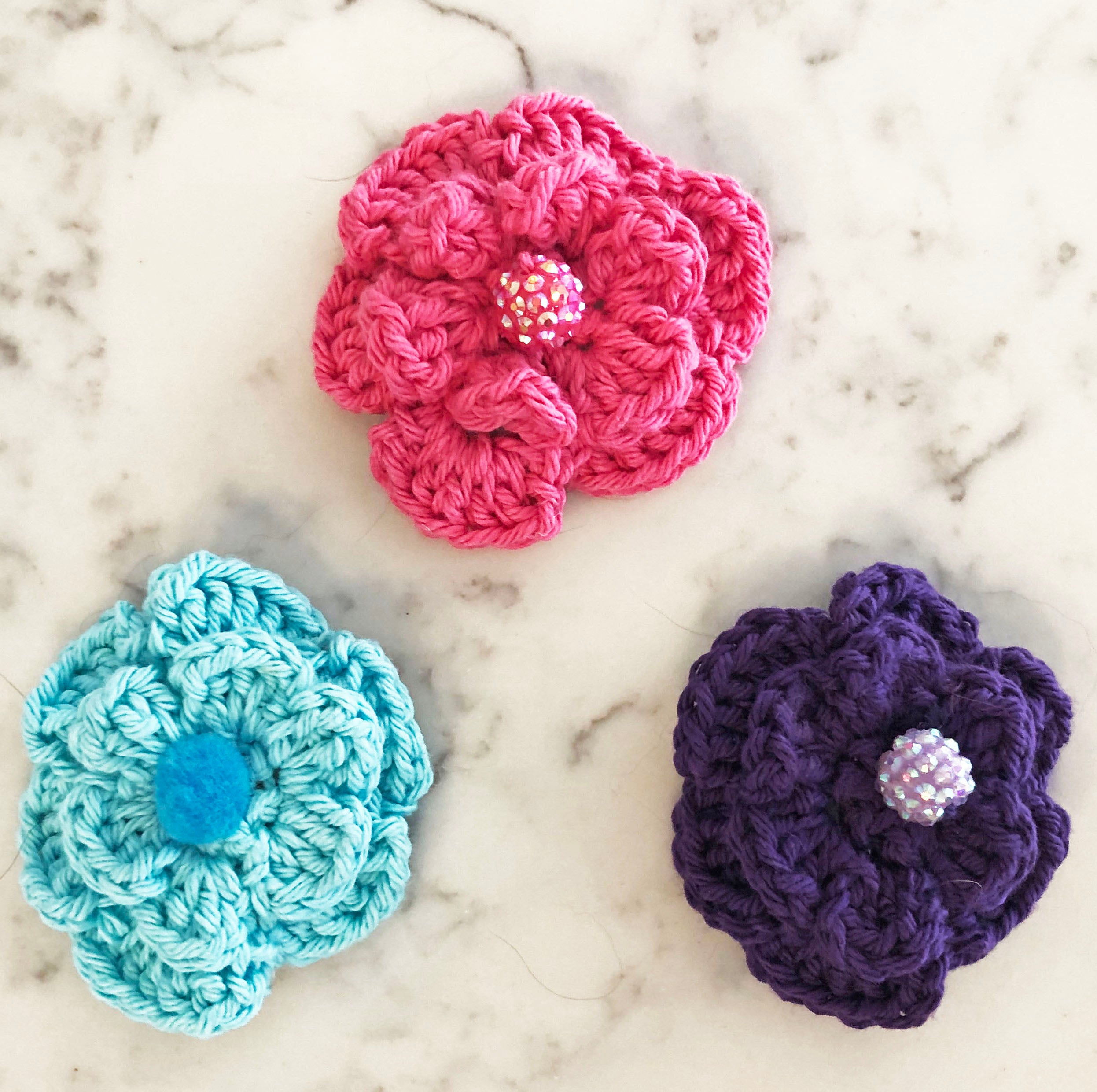 teal flower hair clips