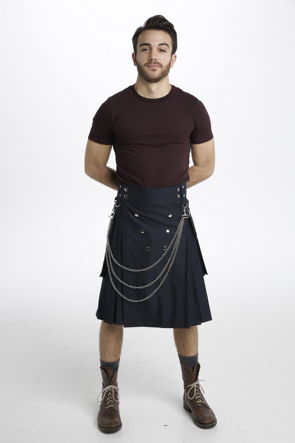 The Royal men Utility Kilt is a handsome cotton kilt that is designed to keep you comfortable during any warm month with its lightweight and breathable nature. It features hooks on either side from which you can hang chains or a sporran of your choice, while six studs adorn the front of the kilt to add some detail