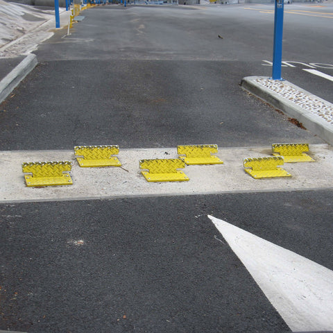 Flow-plates-HGV-one-way-system-vehicle-road-safety-enforcement-heavy-goods-flow-control-traffic-solutions-directional-yellow-ground-submerged-outdoor-ragged-heavy-duty-durable