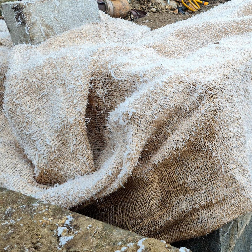 Enhance your construction projects with our premium 100% natural and biodegradable hessian roll, also known as Builders Hessian. Perfect for safeguarding mortar, new brickwork, and concrete from harsh weather conditions and frost. Its breathability allows for natural drying and ventilation.