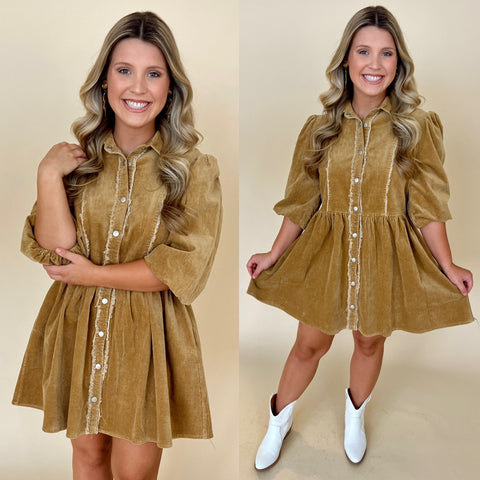 camel corduroy dress with button down front and collar and puff sleeves paired with white boots