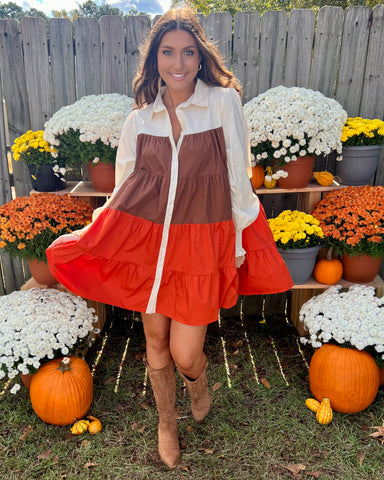 white, orange and brown color block button down dress paired with boots