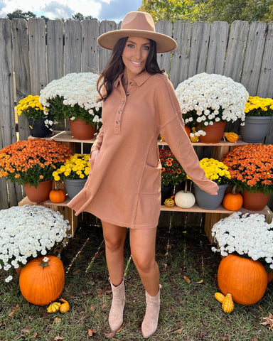brown textured rib button down collared dress with pockets. paired with cowboy boots and a wide brim hat