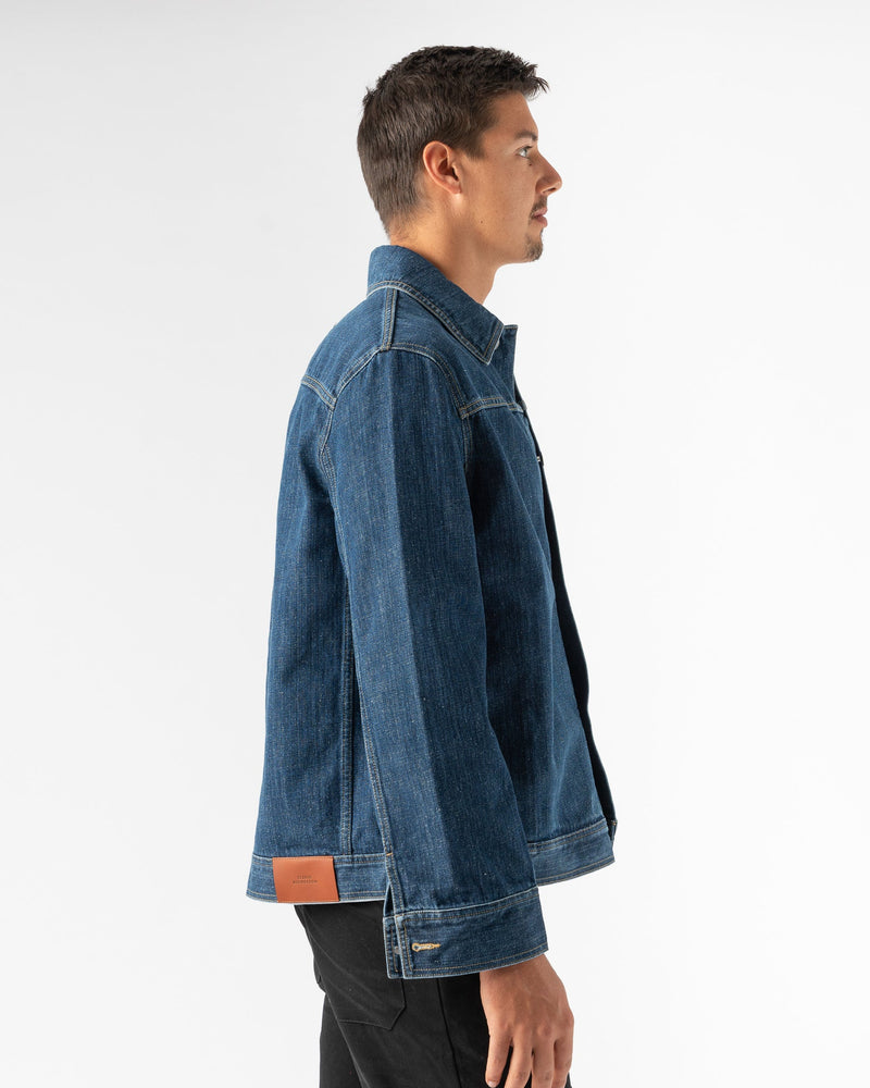 Studio Nicholson Lazar Washed Denim Jacket in Indigo. London based