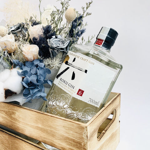 Preserved flowers with a bottle of gin