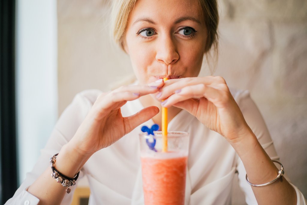 Woman drinking a smoothie