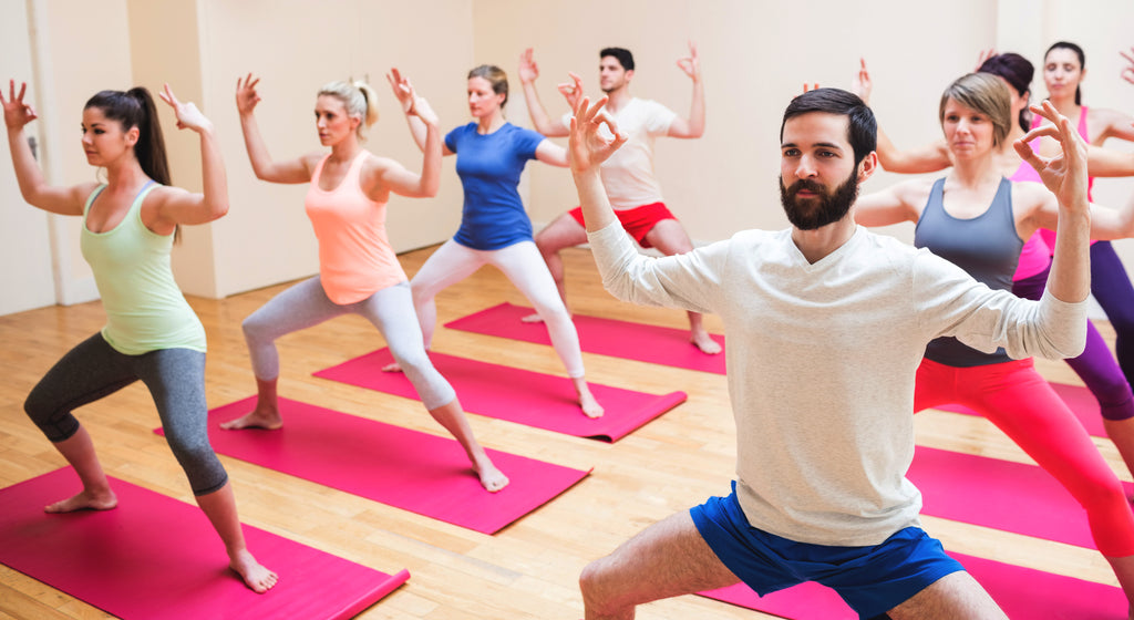 exercise people on mats indoors