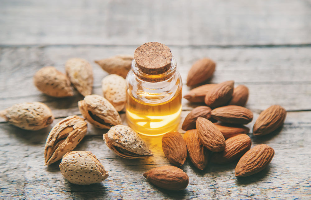 Almond essential oil in a small bottle