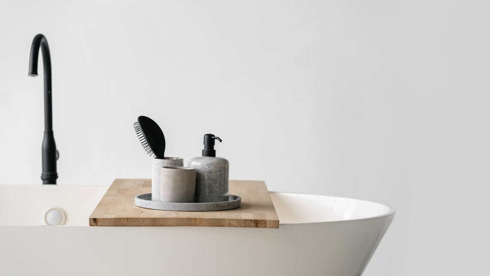 Modern bathtub with shampoo bottle