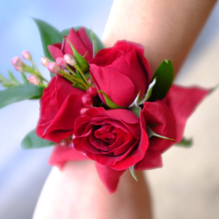 red wrist corsage