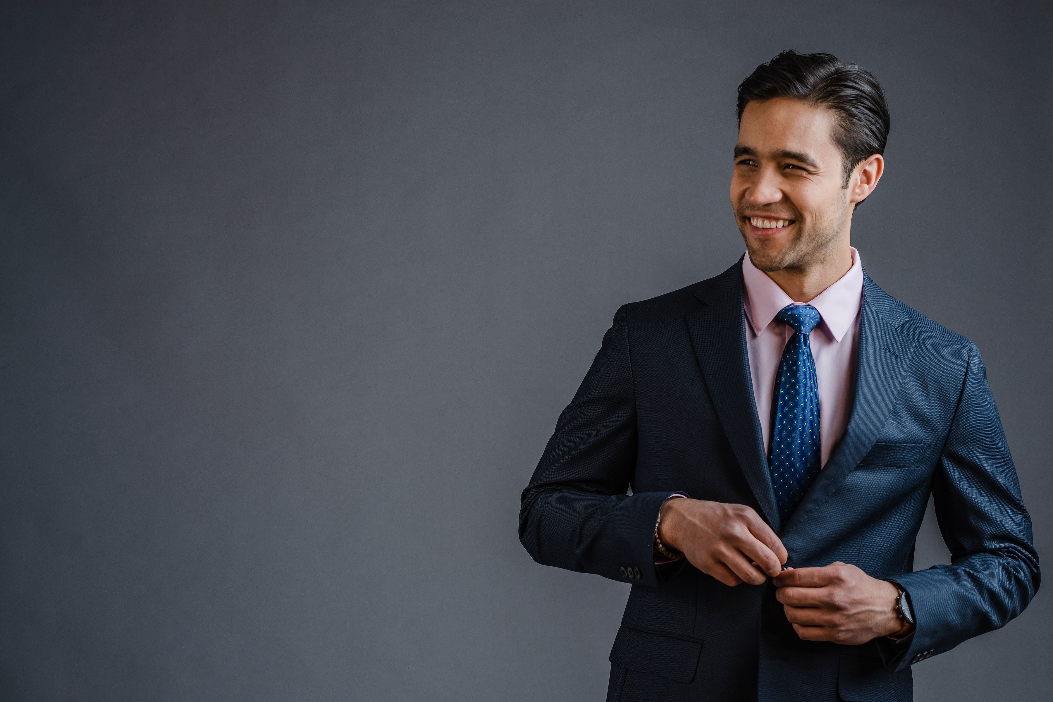 Pink dress shirt with suit and tie