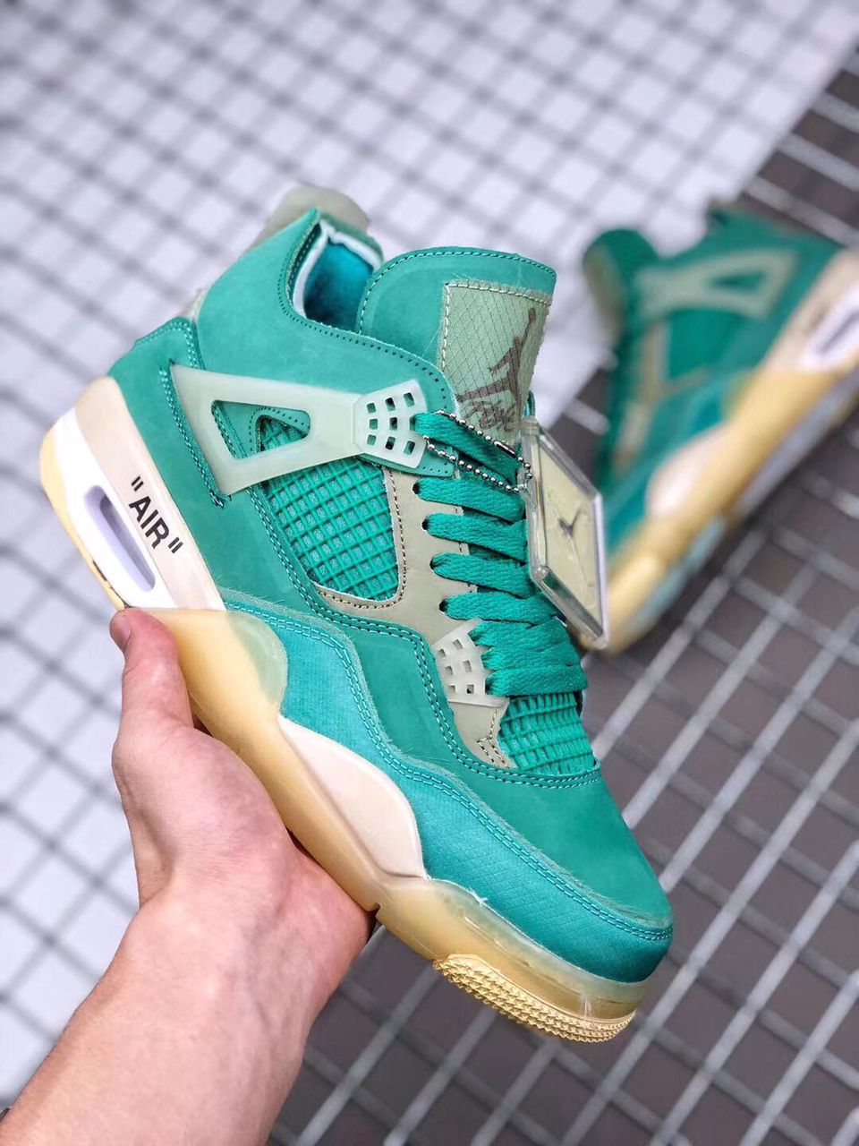 green and white jordan 4