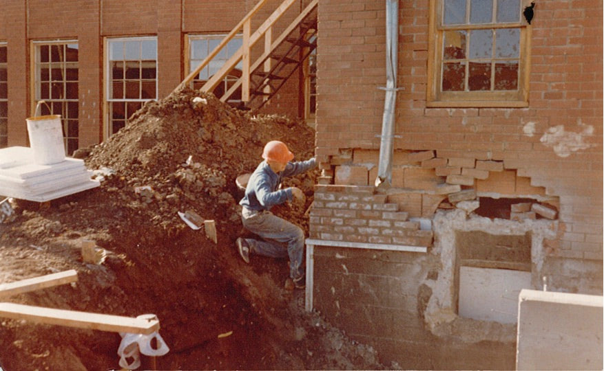 Janina's Jewellers Diamonds And Time Andrzej working art gallery window masonry brick laying Grande Prairie Alberta