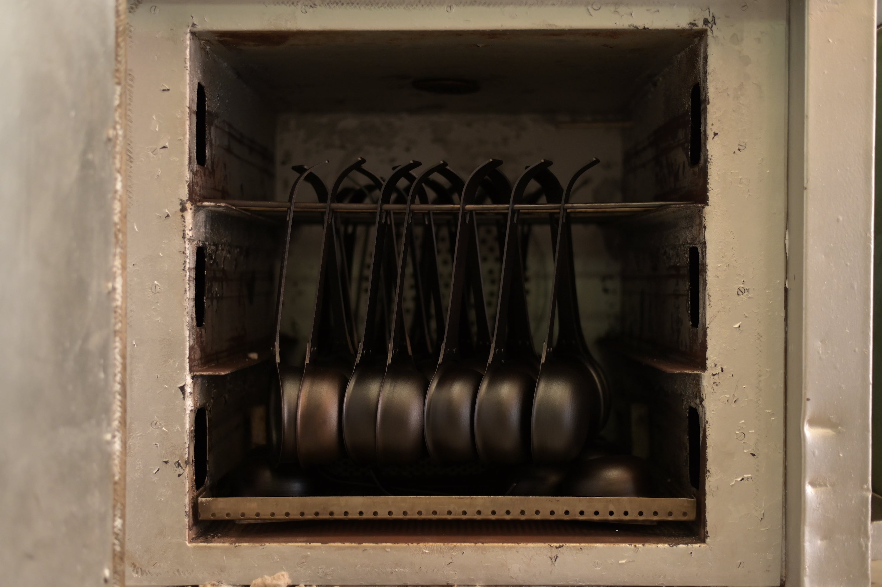 Tadka spoons in the drying process