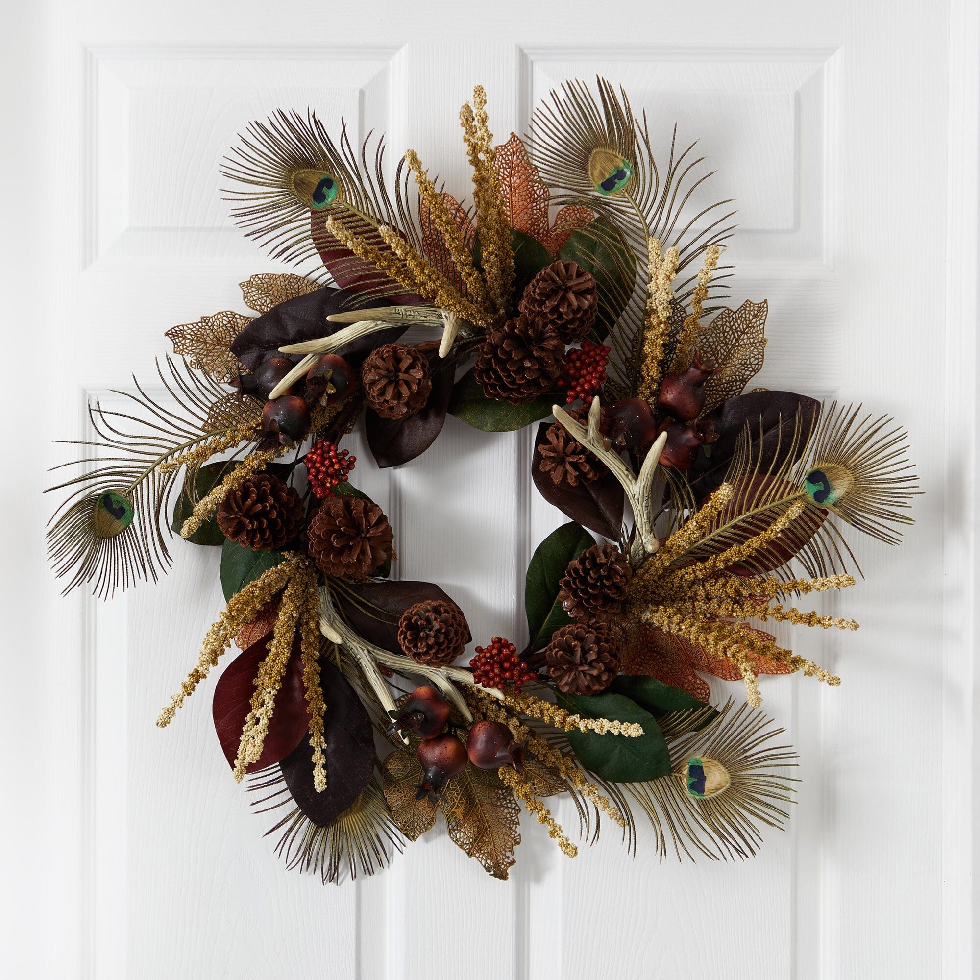  27” Magnolia Leaf, Berry, Antler and Peacock Feather Artificial Wreath 