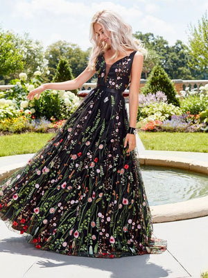 black dress with floral overlay