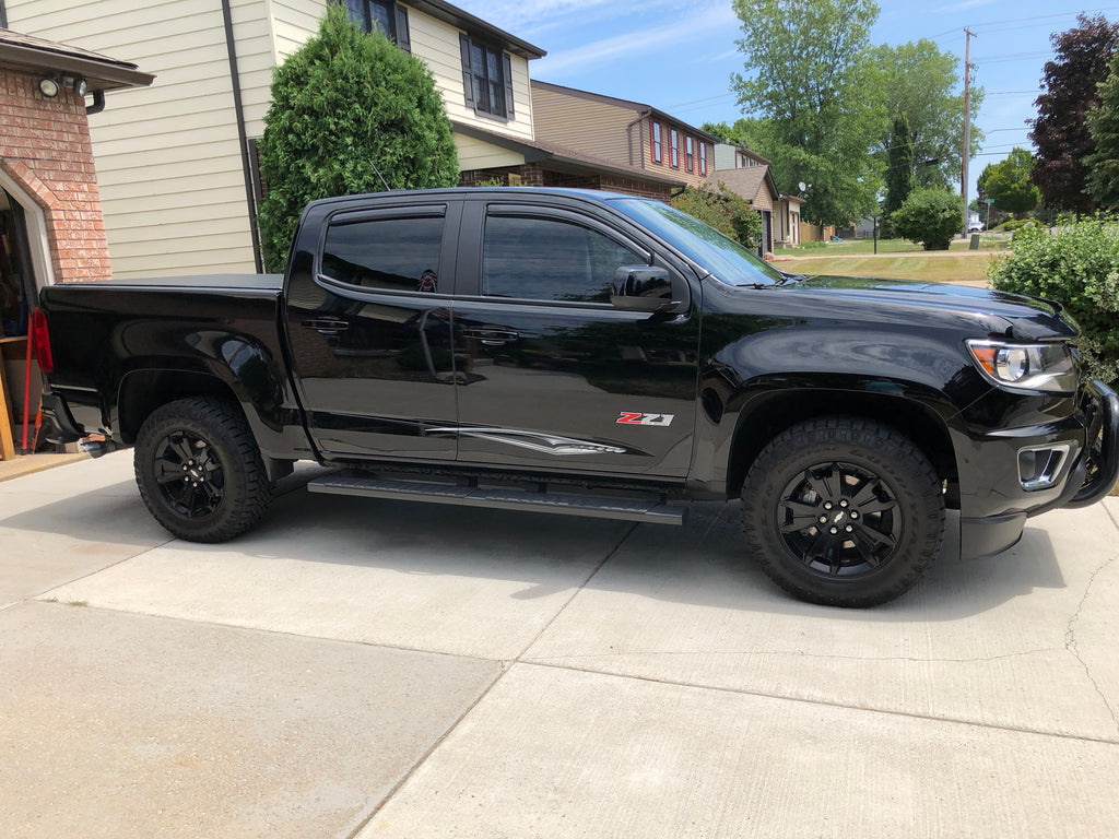 Vinyl Stripe decals on black chevy truck