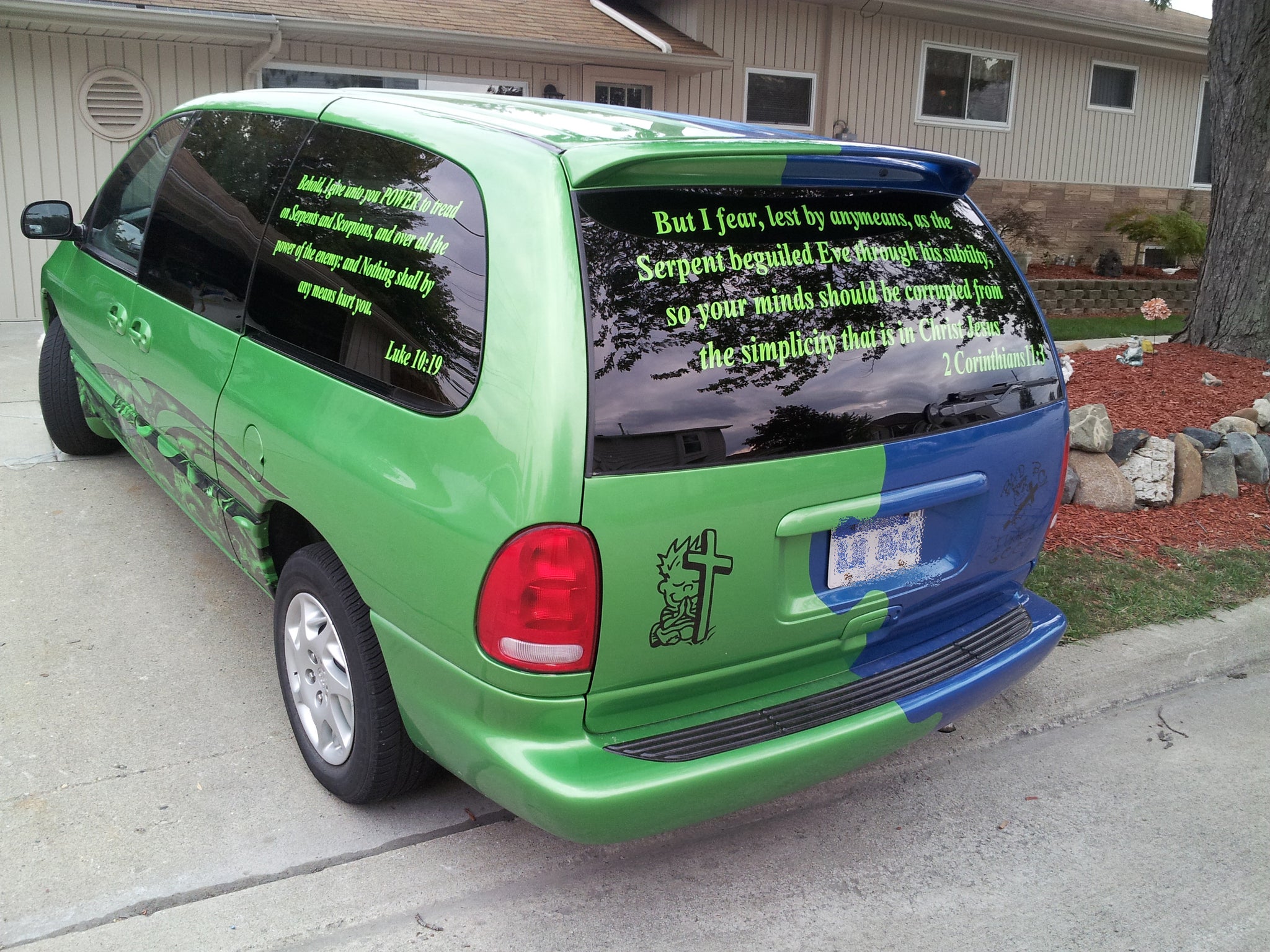 dragon wave vinyl wrap on mini van