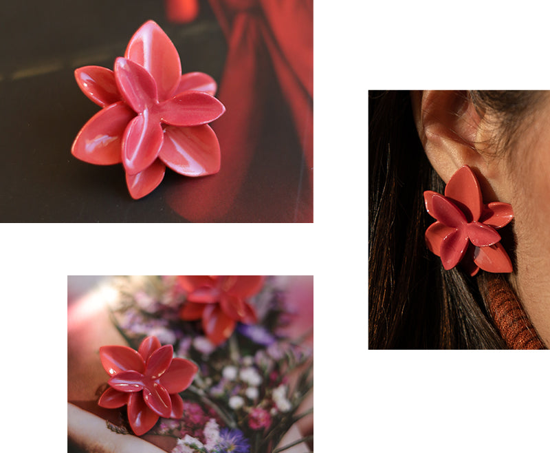 Detailed images capturing the beauty and intricacy of a red flower porcelain earring, highlighting its exquisite details and craftsmanship.