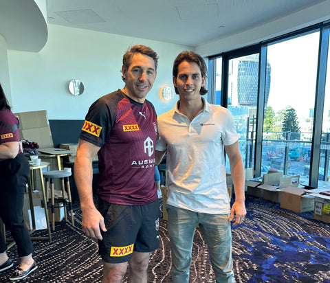 Bauerfeind's Technician posing for a photo with the Maroon's coach, Billy Slater