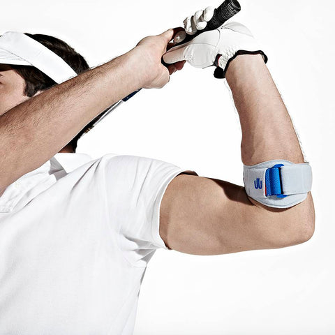 Person playing golf wearing a Bauerfeind elbow strap