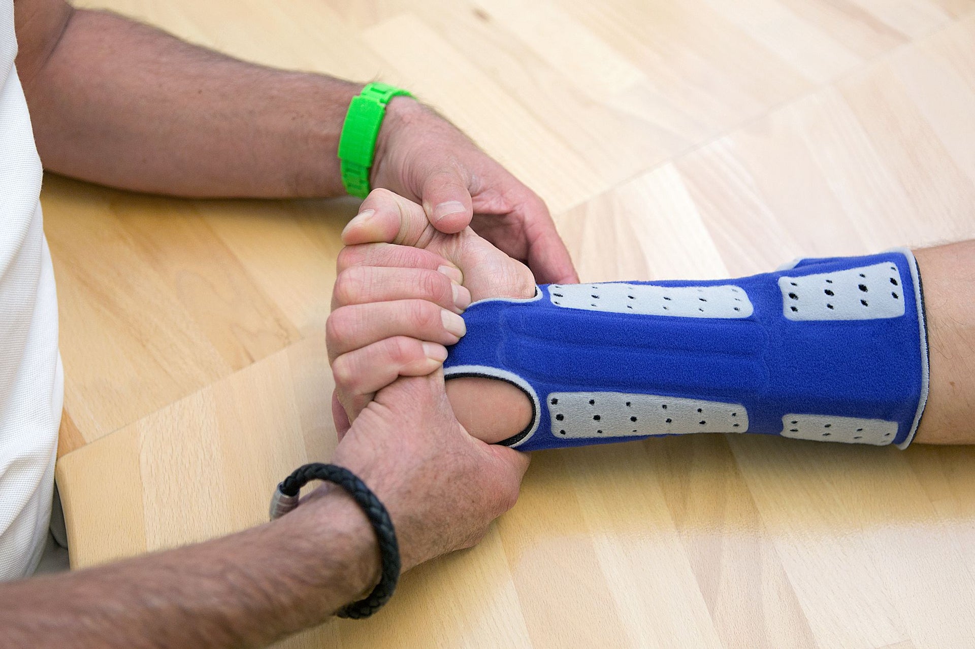 Ddiagnosing arthritis in the wrist with patient wearing Bauerfeind wrist brace