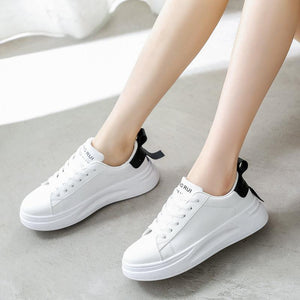 white casual women's sneakers