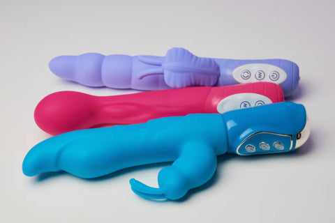 three different colour vibrators