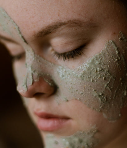 Activated clay mask on face. 