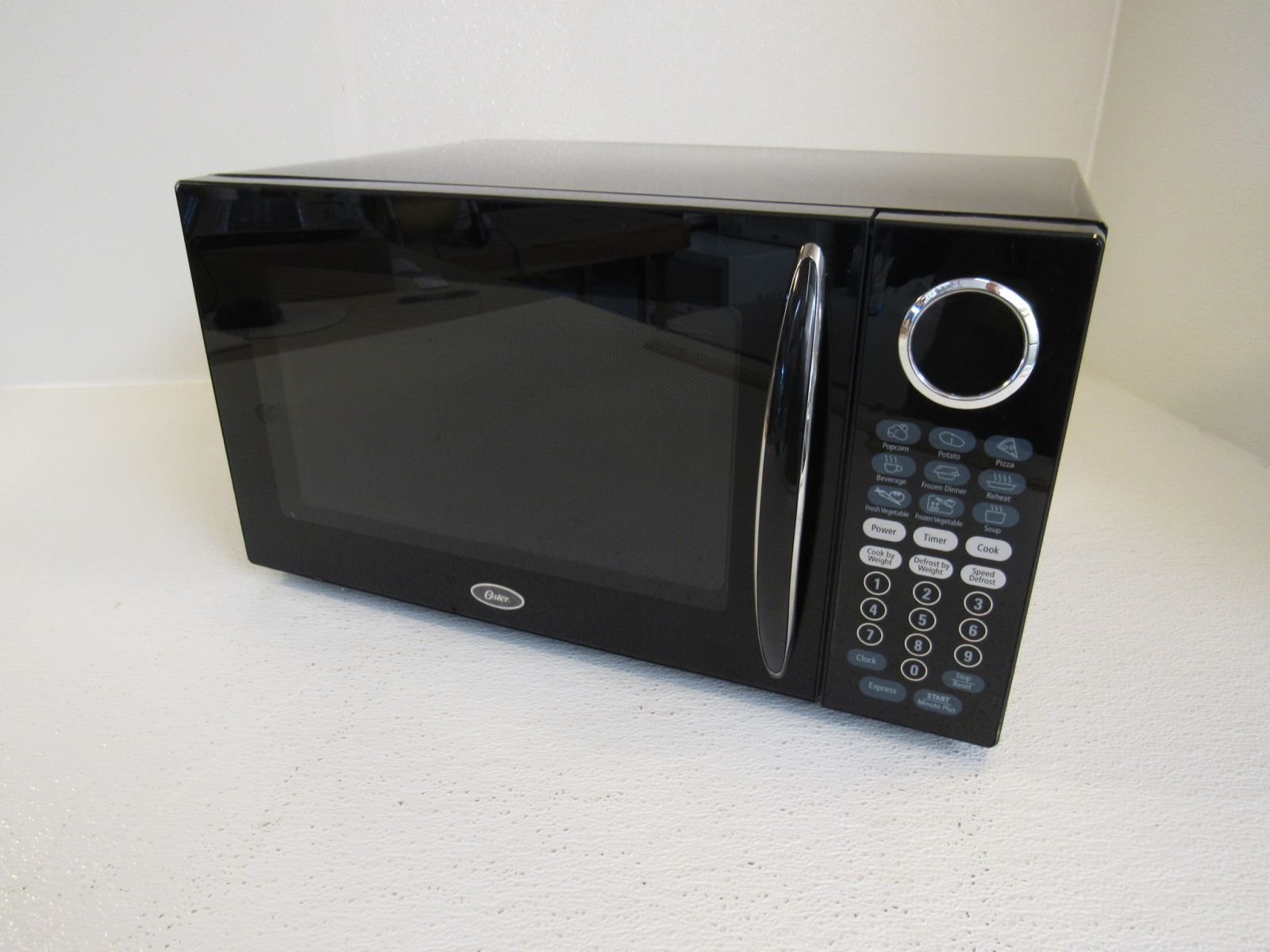 Oster Microwave Oven 1.3-Cu.-Ft. Countertop