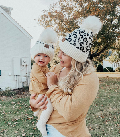 mom and baby in beanies