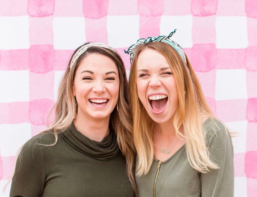 pair women wearing headbands