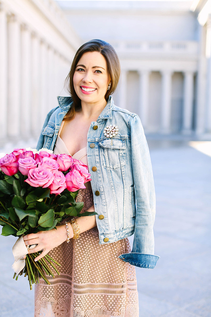 Denim jacket and statement rhinestone brooch