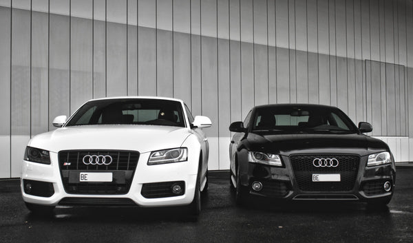 Black and White Audis preparing to be waxed