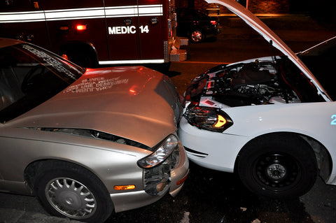 car collision with damaged bumpers