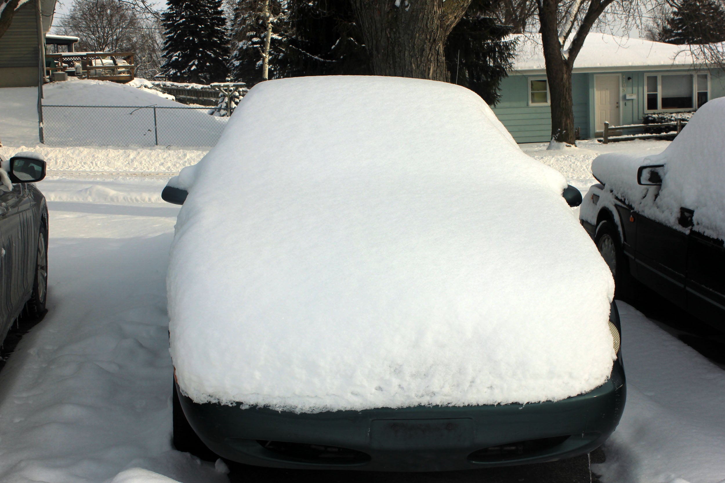 Toyota Camry Covered in Snow