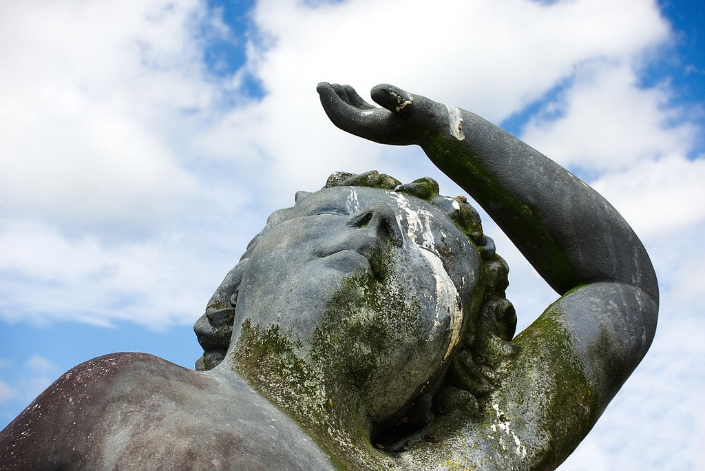 Statue covered in bird poo