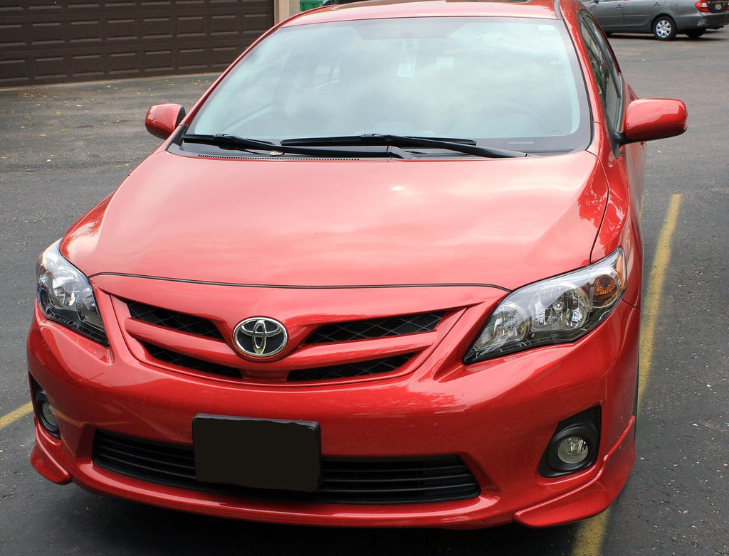 Front Bumper of Red 2016 Toyota Corolla
