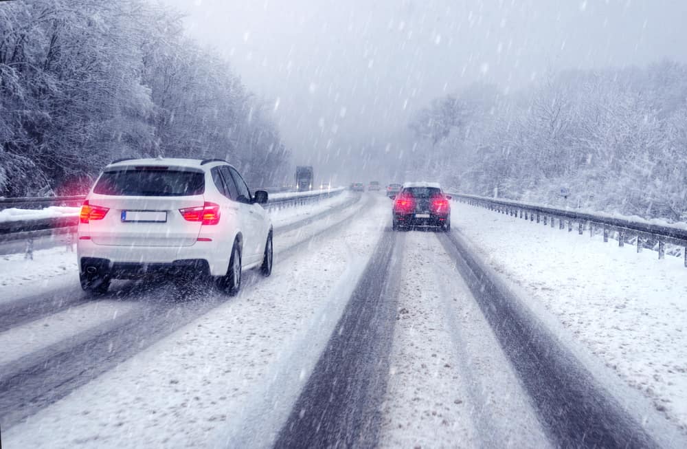 Cars and Trucks on snowy road