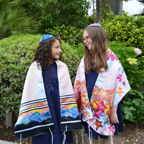 Alma and Eva modeling Mountain Tallit and Fall Leaves Tallit by Anna Abramzon