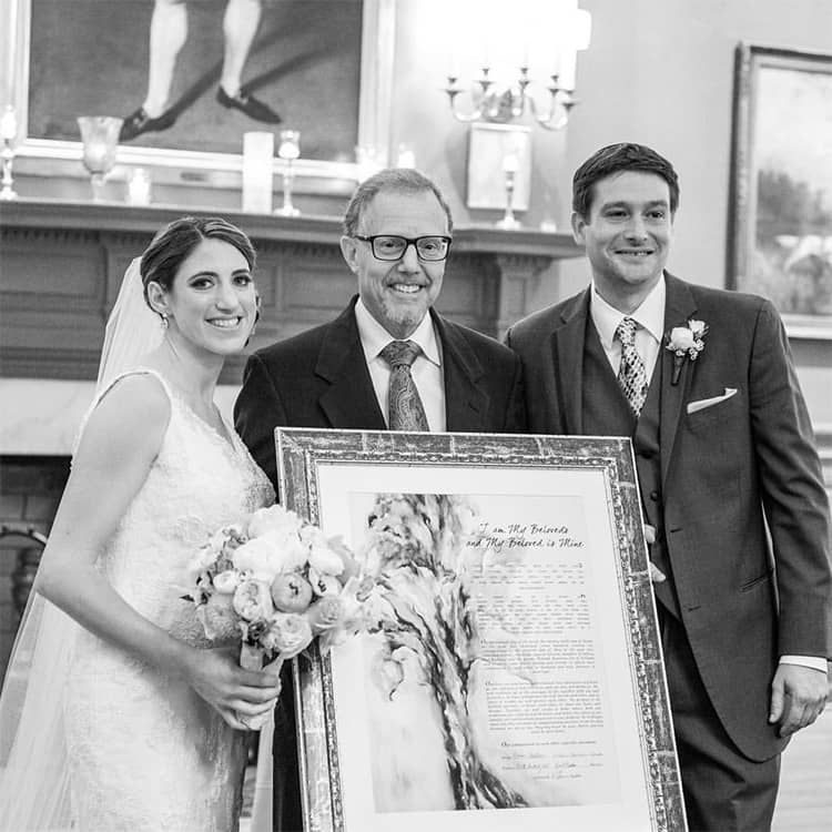 Another loving couple and their rabbi are keeping ketubah history going!