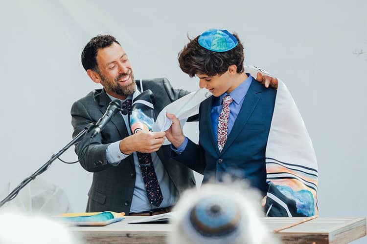 Bar mitzvah tallit on a Jewish boy