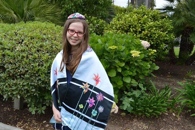 a Jewish girl in a tallit