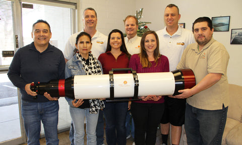 Group of Staff Holding the Lunt 230mm Double Stack Solar Telescope with 34mm Blocking Filter