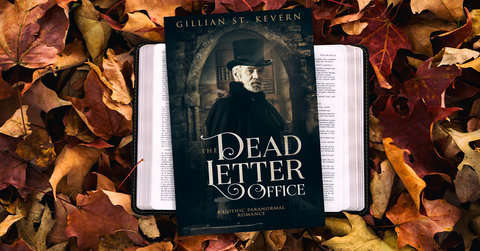 The Dead Letter Office cover resting on a bed of autumn leaves