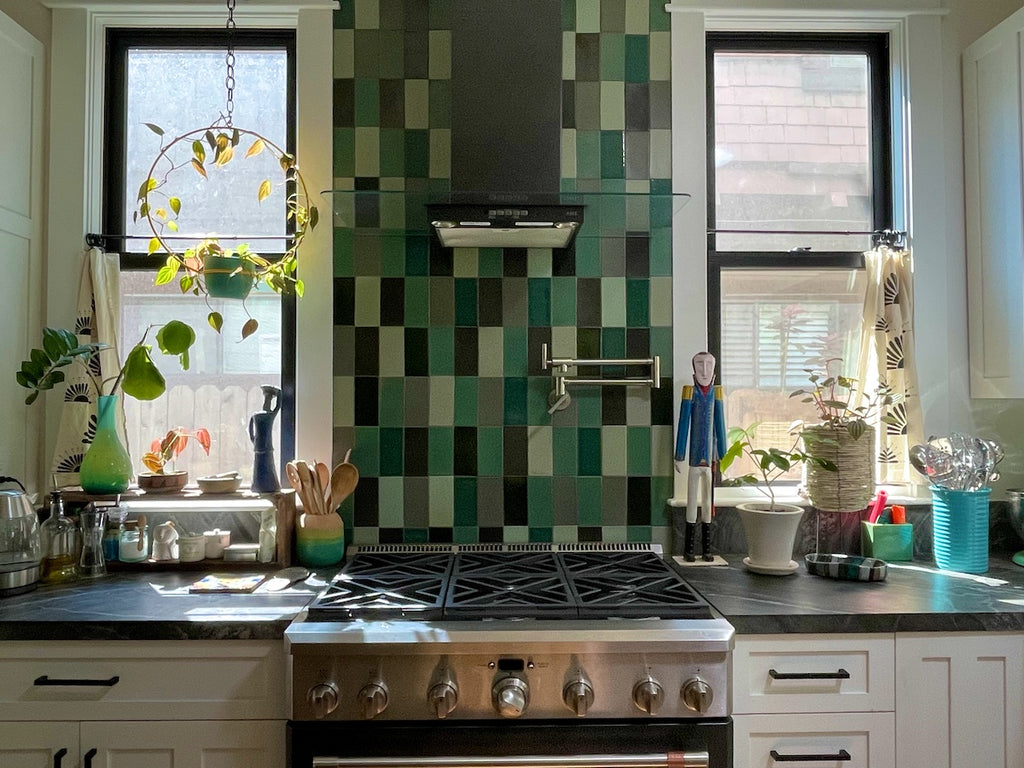 Kitchen featuring Heath Tile and decorating with houseplants.