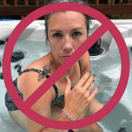 Bad Trish wearing jewelry in the hot tub