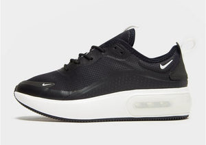 tenis nike negro con suela blanca