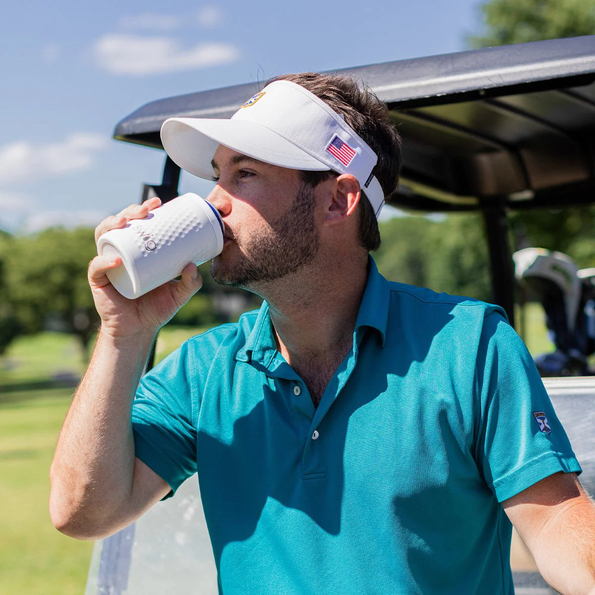 https://cdn.shopify.com/s/files/1/0110/8934/6622/products/swig-life-signature-12oz-combo-can-cooler-golf-partee-lifestyle_1800x1800.webp?v=1680909404