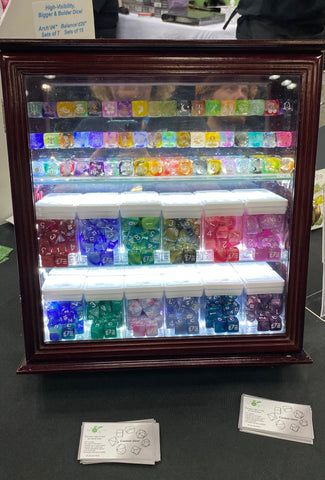 custom dice display showing new colors and examples of image etching on dice